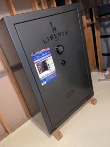 Unique Movers team moving an 800-pound safe.