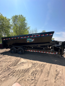 Unique Movers roll off dumpster