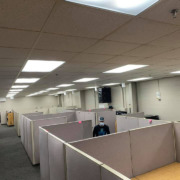 During an office move, the Unique Movers team works on moving a section of cubicles near Sartell, MN.