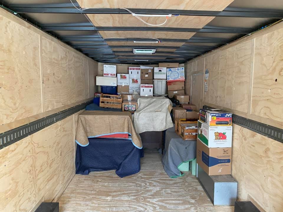 home-moving-truck-size-movers-needed01 A half-full home moving trailer packed half-full by the Unique Movers team.